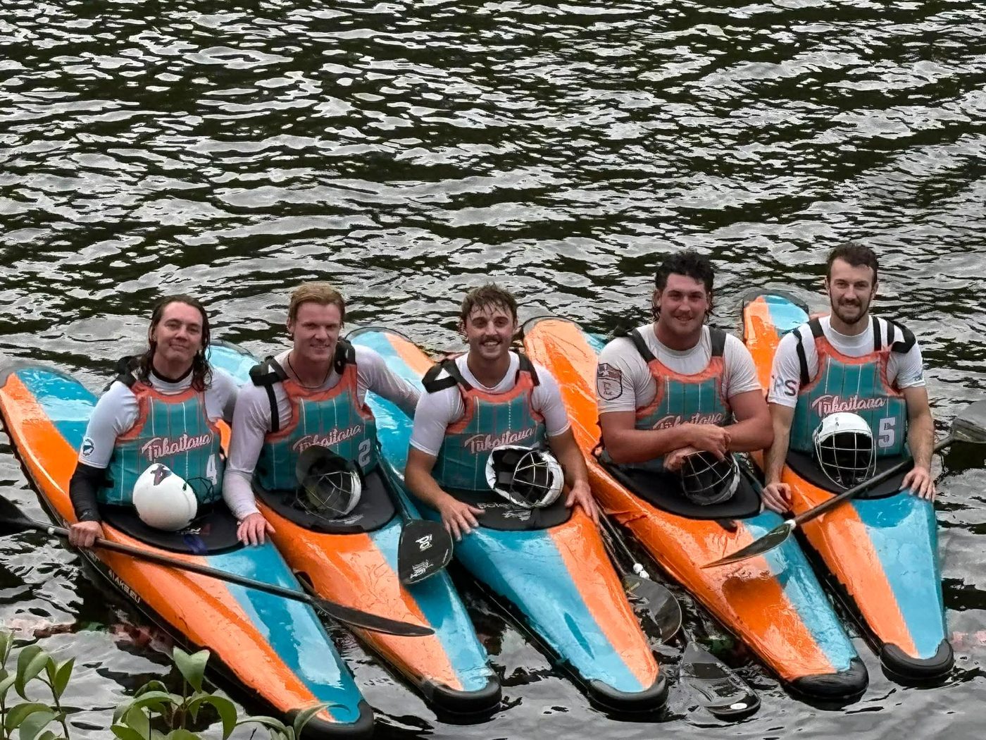 Elisha with his kayak team