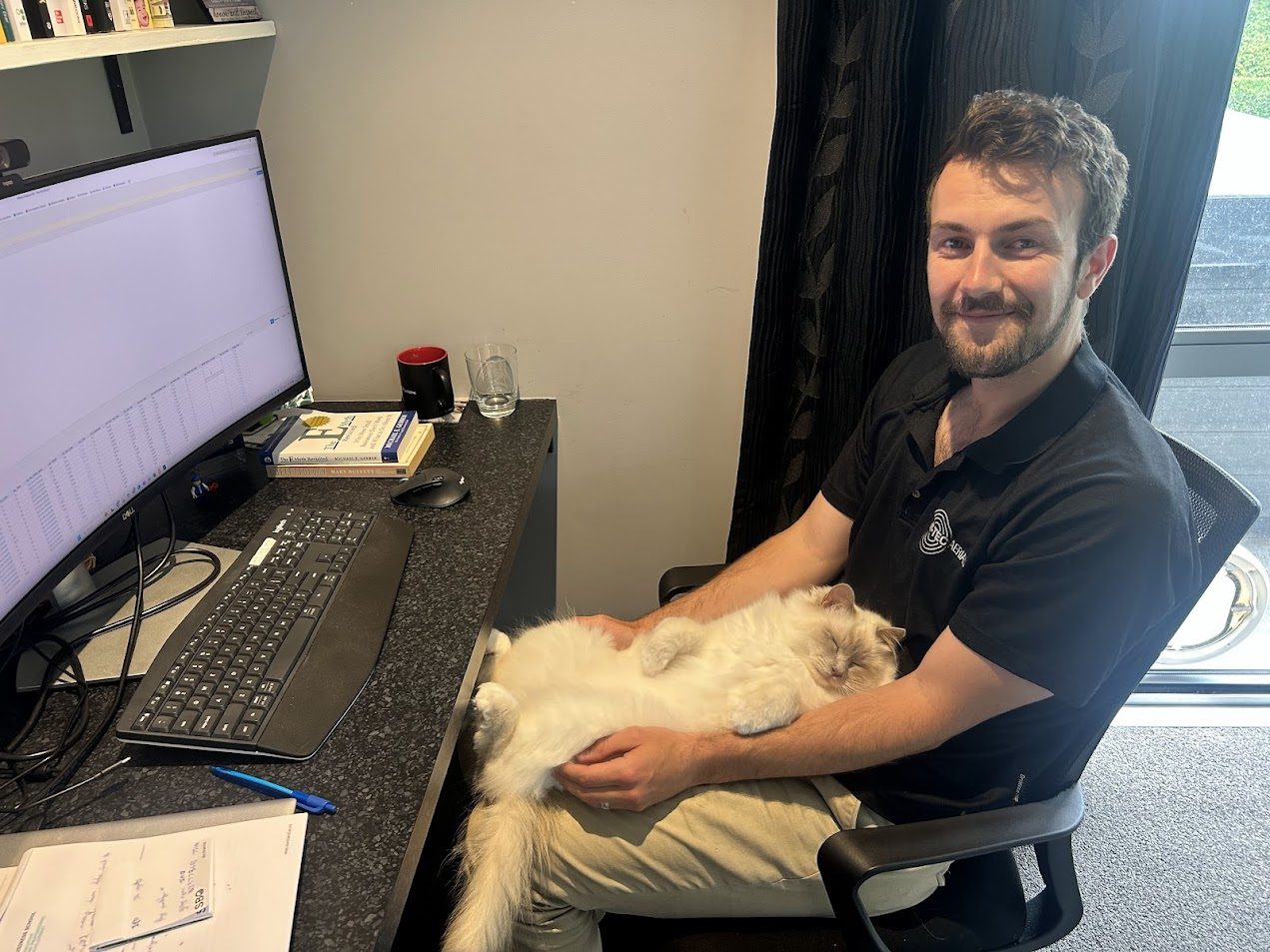 Elisha working at his desk